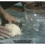 Image of Julia Child dropping dough science on us viewers while making croissants.