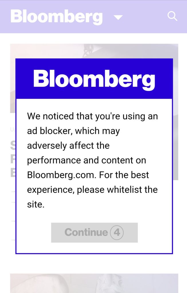 Screenshot of a popup on Bloomberg.com that says "We notcied that you're using an ad blocker, which may adversely affect the performance and content on Bloomberg.com. For the best experience, please whitelist the site."